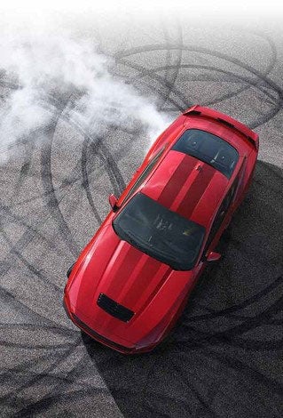Overhead view of a 2024 Ford Mustang® model with tire tracks on pavement | O'Rourke Motors Inc in Tipton IA